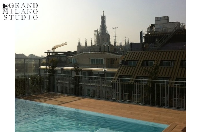 D-YK 37. Modern apartment with a terrace and a swimming pool in the heart of Milan